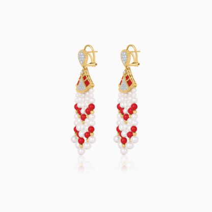 Step into elegance with our captivating 18K Yellow Gold Dangling Earrings, designed to enhance your natural beauty with their brilliant Sparkling natural diamonds vibrant coral stones and vibrant colours.