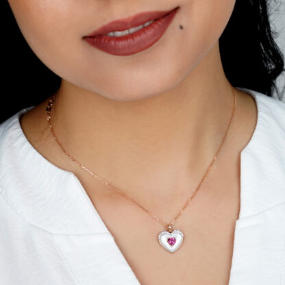 18K ROSE GOLD NECKLACE WITH WHITE MOP HEART SHAPE DECORATED BY NATURAL DIAMOND AND PINK TOPAZ IN THE CENTER - Image 2