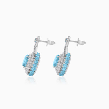 18K White Gold Earring featuring a stunning Natural Diamond and Blue Topaz stones