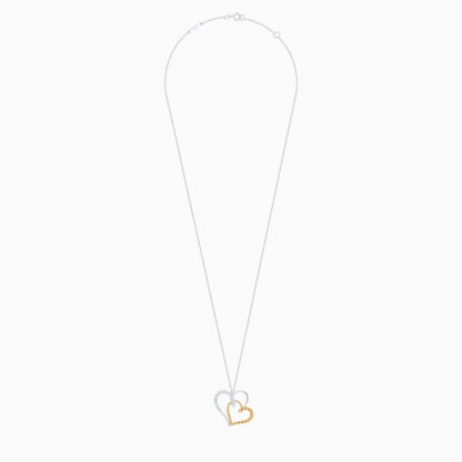 18k yellow and white gold NECKLACE in the shape of 2 HEARTS ATTACHED studded with natural diamonds
