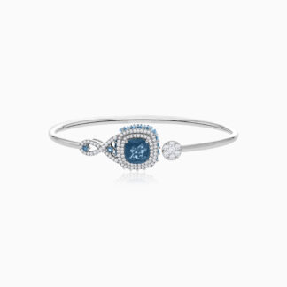 18K White Gold bangle featuring a stunning Natural Diamond and Blue Topaz stones