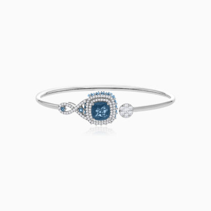 18K White Gold bangle featuring a stunning Natural Diamond and Blue Topaz stones