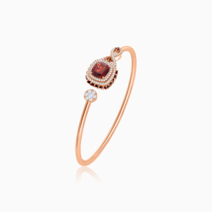 18k Rose Gold Bangle featuring a stunning Garnet Gemstone, beautifully complemented by natural diamonds
