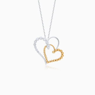 18k yellow and white gold NECKLACE in the shape of 2 HEARTS ATTACHED studded with natural diamonds