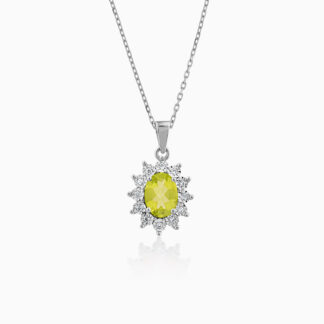 18k White Gold Necklace adorned with a stunning natural peridot centrepiece, surrounded by natural diamonds. Part of the prestigious Diana Collection, this necklace draws inspiration from the iconic royal jewellery worn by Princess Diana. The delicate rose gold complements the soft blush of the Rose Quartz, while the diamonds add a touch of brilliance, creating an elegant piece that evokes timeless beauty and sophistication.