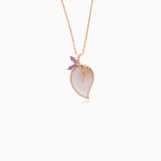 18k rose gold necklace features a delicate design embellished with vibrant pink artificial stones, creating a striking contrast against the warm hues of the gold. The centrepiece showcases a beautifully crafted leaf shape made from pink mother of pearl, adding an elegant touch that enhances the necklace's overall charm. Perfect for various occasions, this piece embodies femininity and sophistication, making it a stunning addition to any jewelry collection.