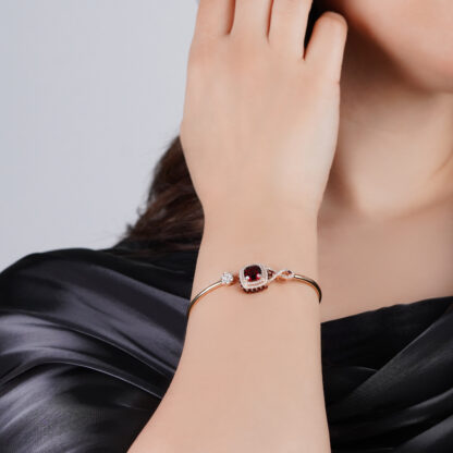 18K Rose Gold Bangle featuring a stunning Natural Diamond and Garnet - Image 2