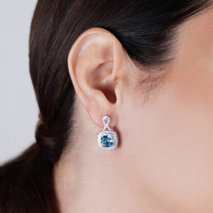 18K White Gold Earring featuring a stunning Natural Diamond and Blue Topaz stones - Image 2