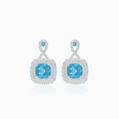 18K White Gold Earring featuring a stunning Natural Diamond and Blue Topaz stones