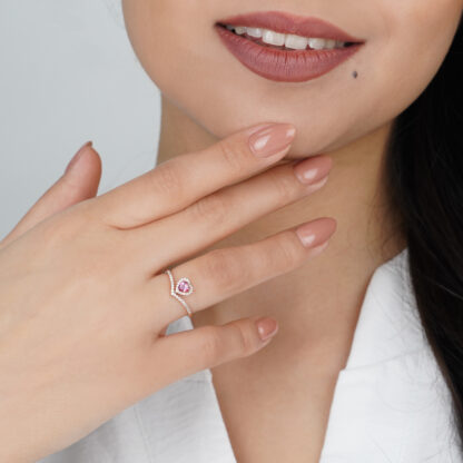 18K Rose gold ring with heart shape of Pink Topaz surrounded by natural diamond stones