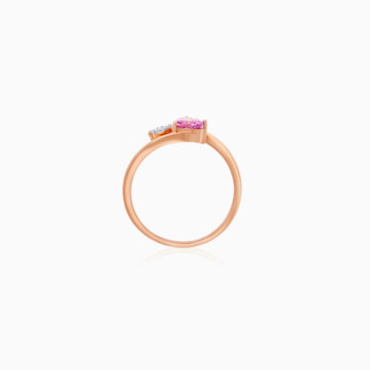rose gold ring with 2 heart shapes of natural diamond and pink topaz stone made from 18k