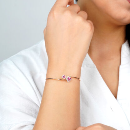 18K Rose gold bangle with 2 hearts of Pink Topaz Surrounded by Natural Diamonds